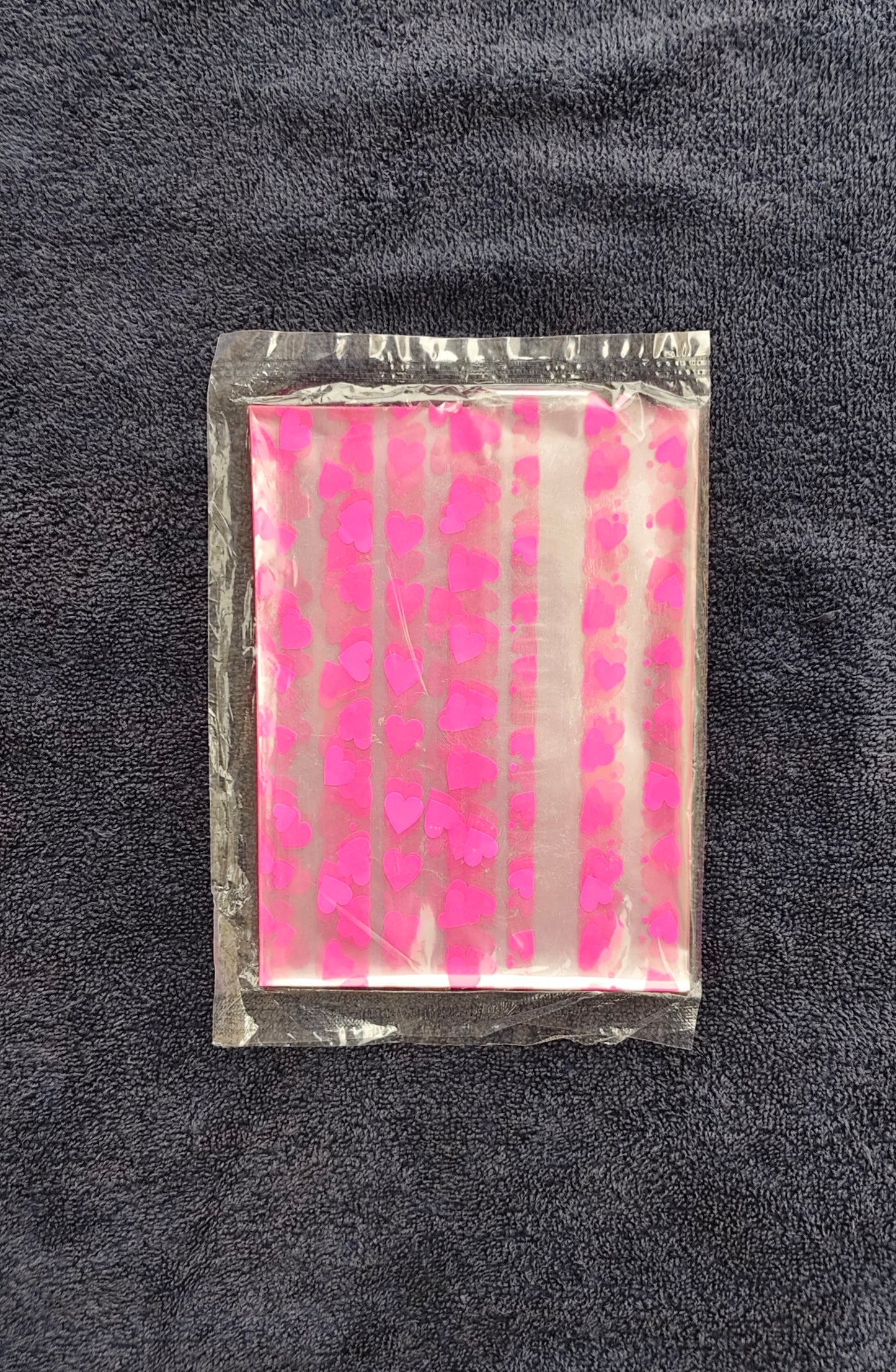 Kon Repar Vibrant pink heart-themed Pouches